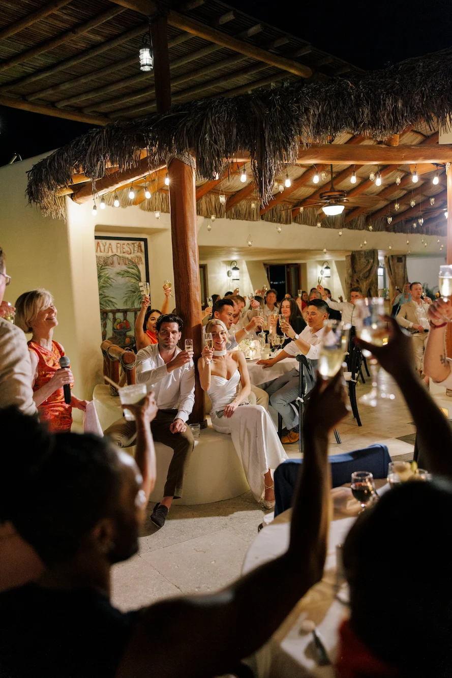 Evgenia Kostiaeva photographing a wedding in Puerto Vallarta at golden hour
