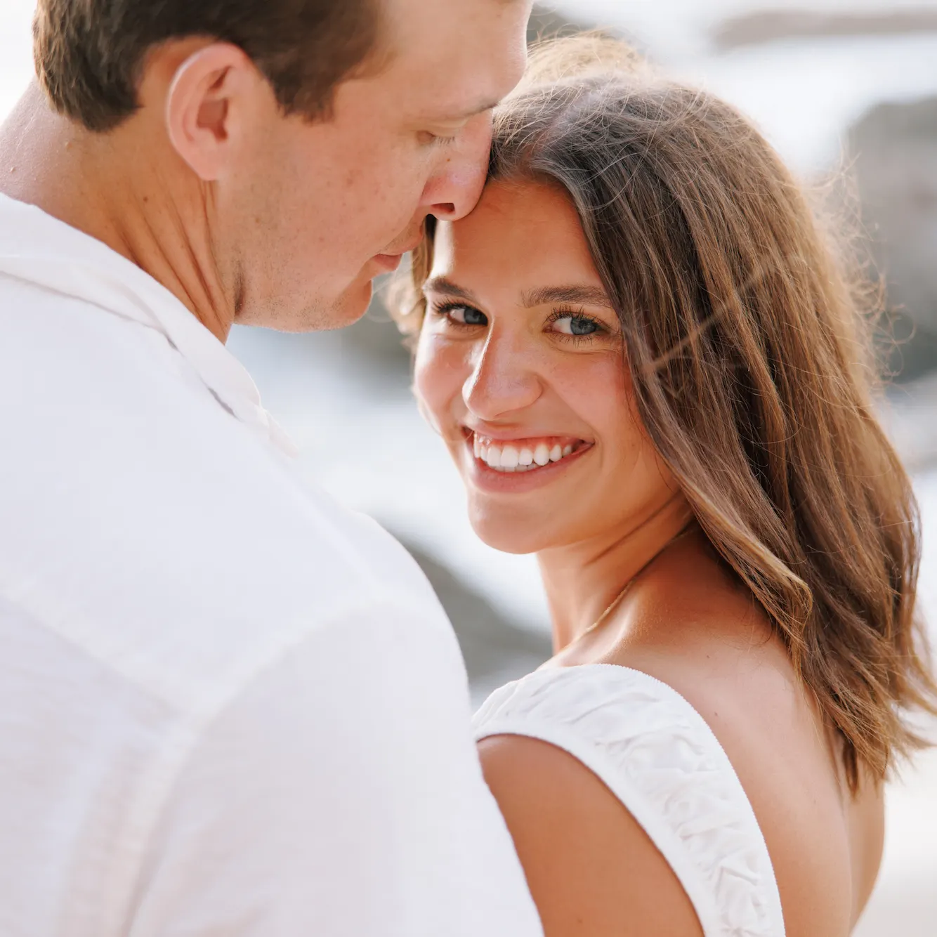 Couple embracing at golden hour on a Puerto Vallarta beach