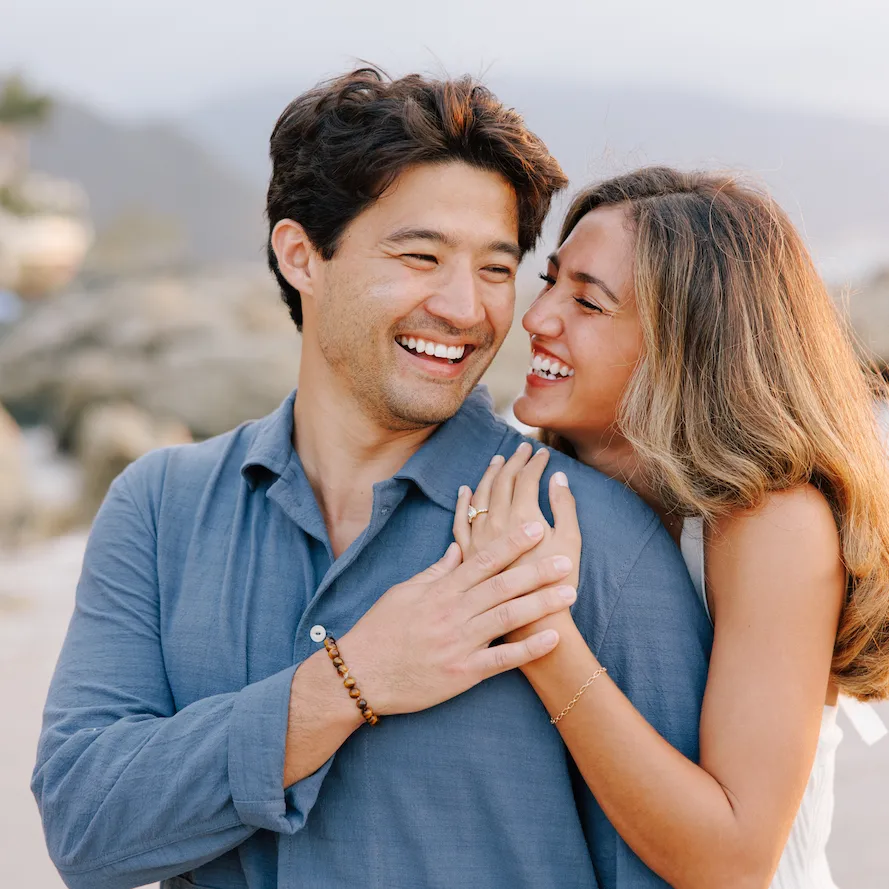 Man proposing to his partner on Conchas Chinas Beach, Puerto Vallarta